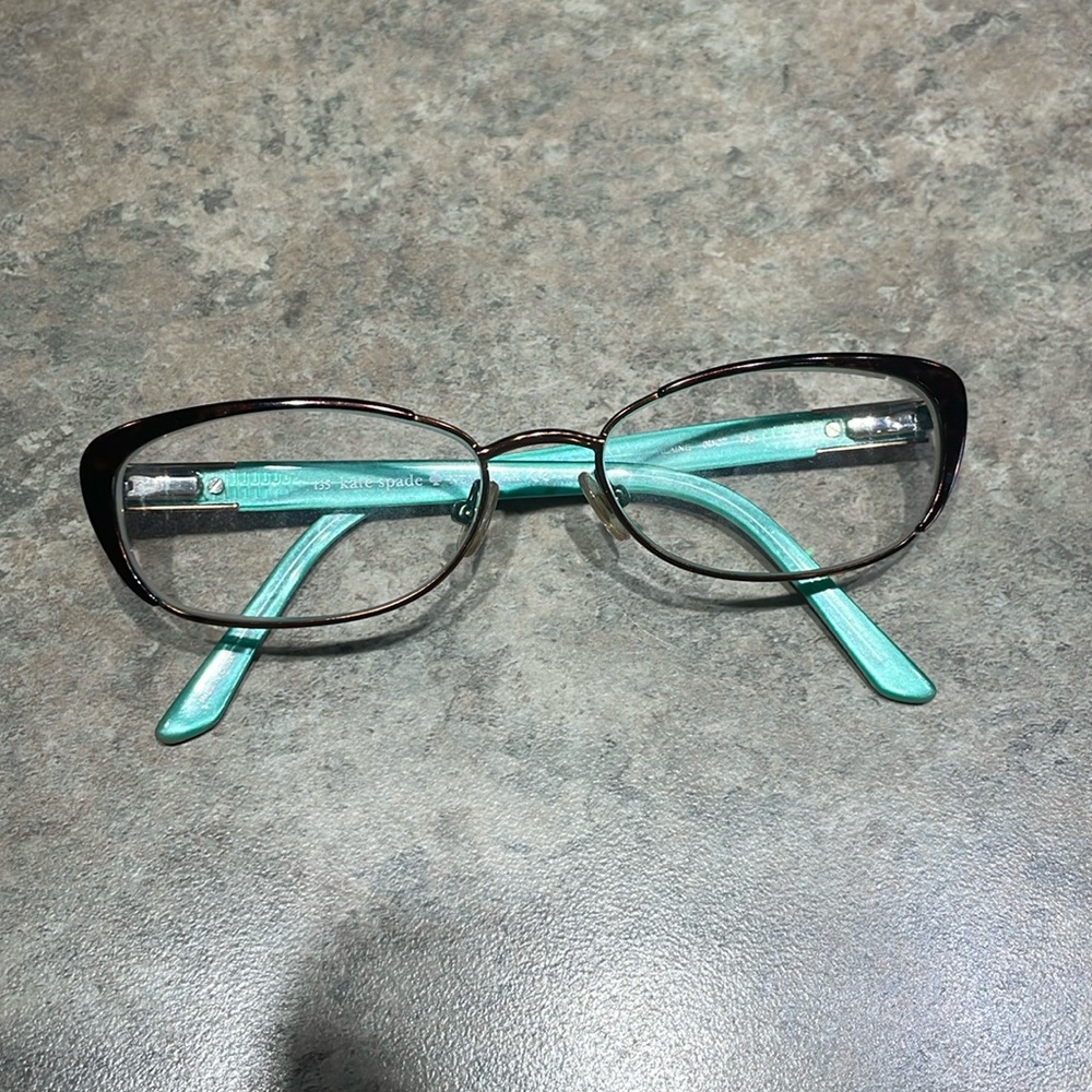 Kate Spade reading glasses. Slight prescription. +\- 1